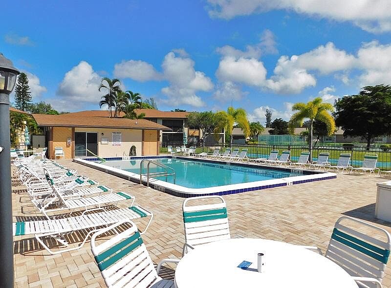 Davis Woods Brighton Realty and Management