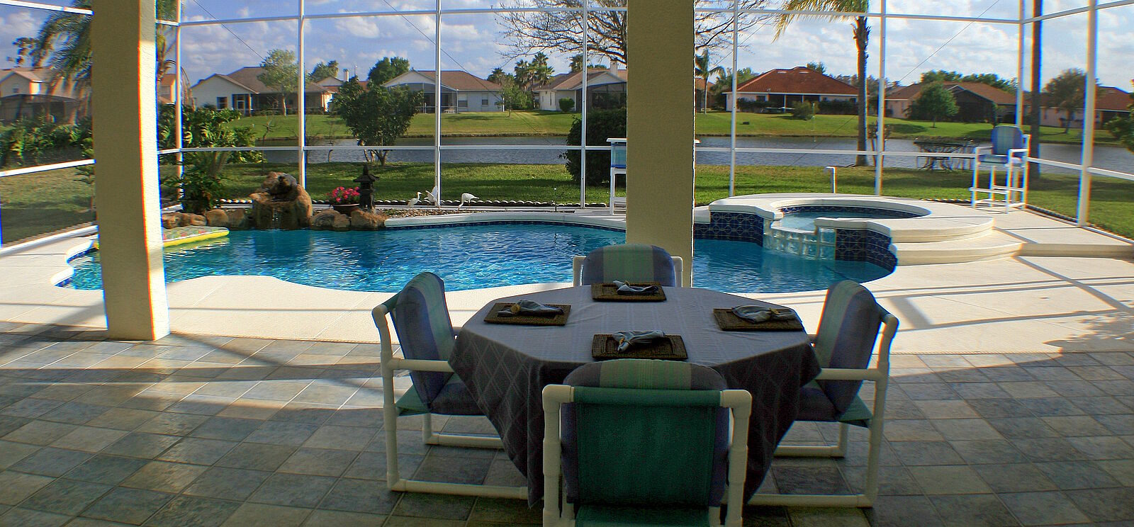 lanai with pool and hot tub